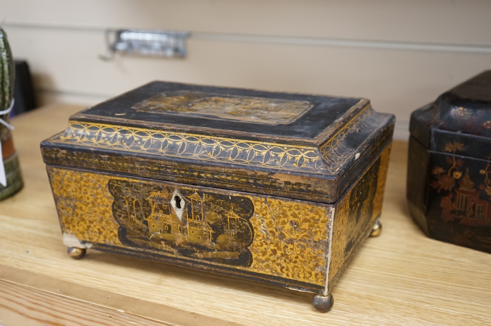 A Chinese lacquer tea caddy and a japanned sewing box (2)